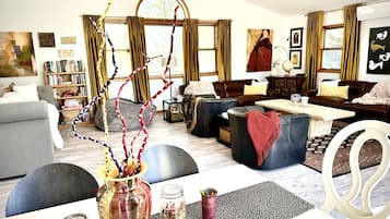 Smart TV, fireplace, foosball, books