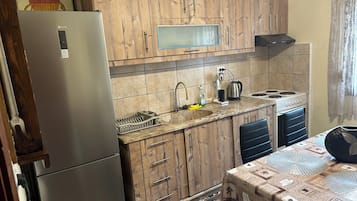 Villa básica | Cocina privada | Cafetera de espresso, cafetera y tetera, tetera eléctrica y tostadora
