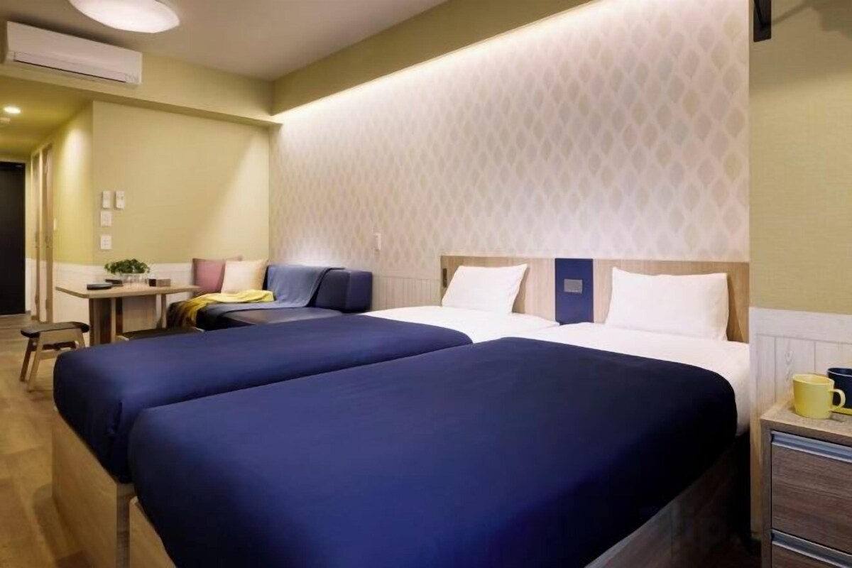 Premium bedding, down duvets, in-room safe, desk