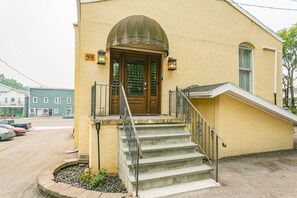 Main entrance with steps and railings