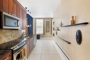 Galley kitchen with extensive counter space