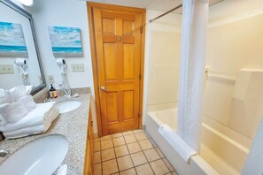 Combined shower/bathtub, hair dryer