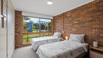 4 bedrooms, iron/ironing board, travel crib, internet