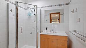 Combined shower/bathtub, hair dryer