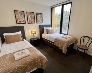 2 bedrooms, desk, iron/ironing board, travel crib