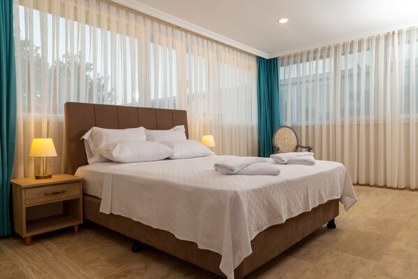 Standard Quadruple Room | Premium bedding, minibar, in-room safe, desk