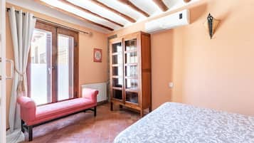 1 bedroom, desk, iron/ironing board, travel cot