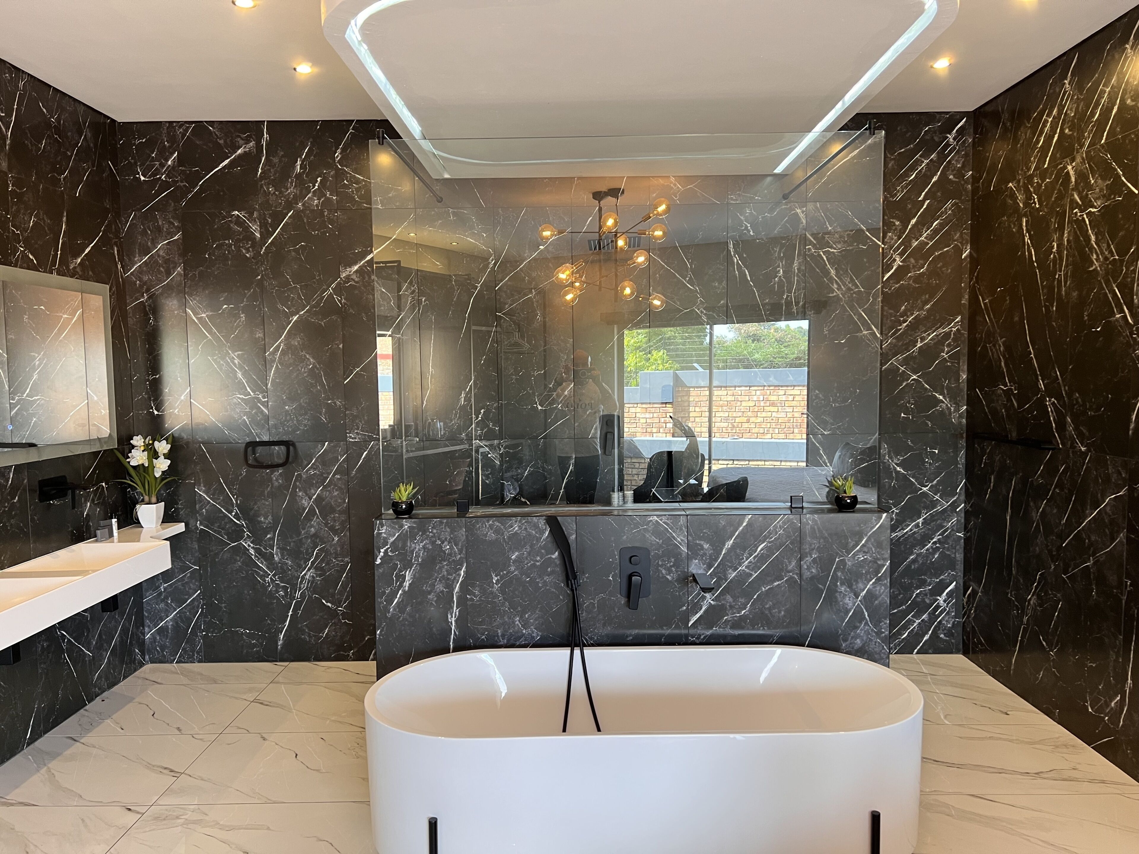 Designer toiletries, hair dryer, soap, shampoo