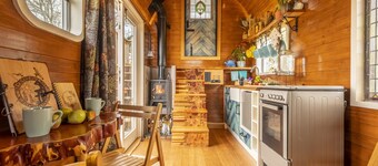 Oozing character and hidden surprises, Dixie is a repurposed horse box set in a wonderful wild flowe