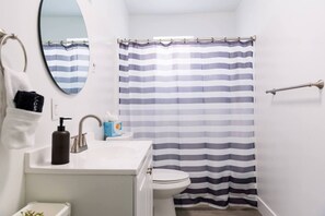 Hair dryer, towels, soap, toilet paper