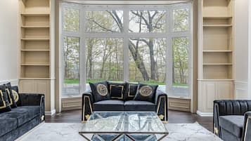 Royal Villa | Living area | 65-inch LED TV with digital channels, TV, Netflix