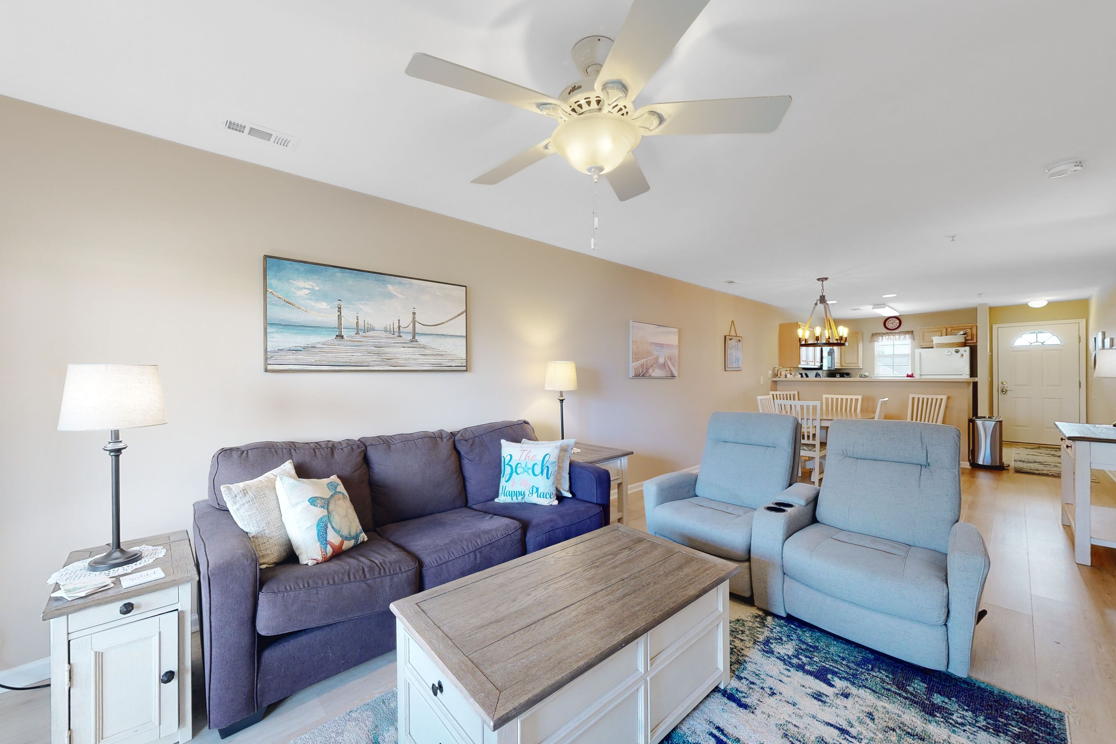 The Palms condo with a furnished balcony, pond view, washer/dryer, & pool