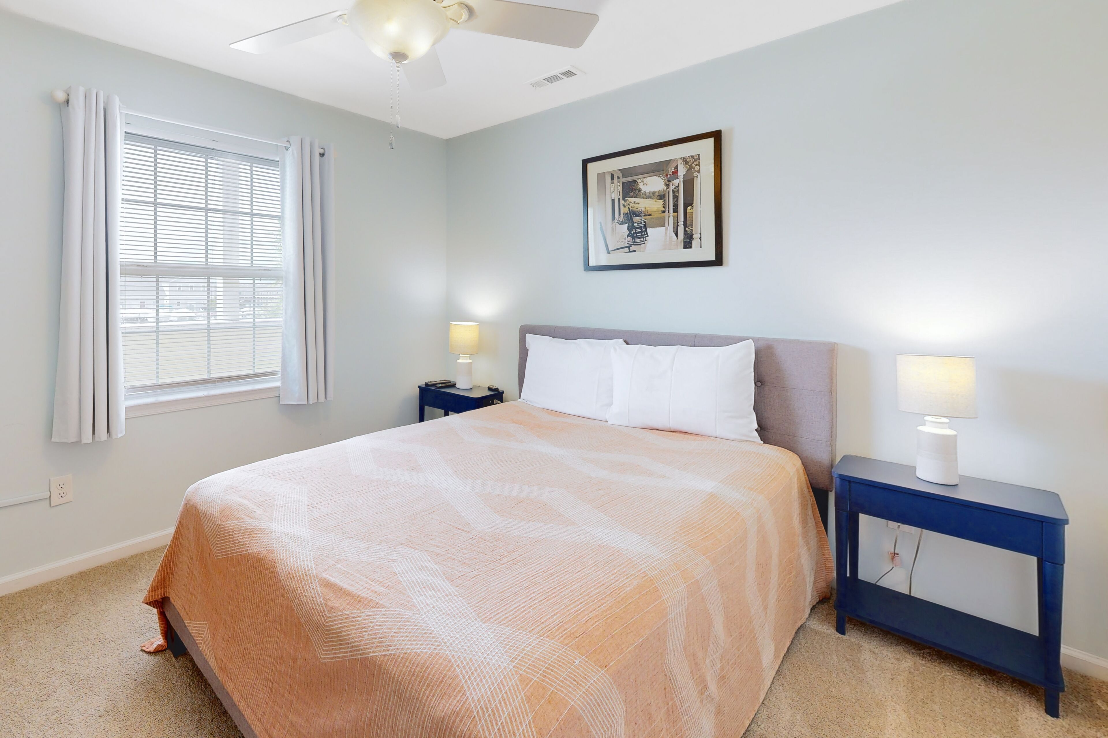 The Palms condo with a furnished balcony, pond view, washer/dryer, & pool