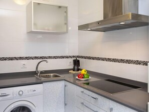 Fridge, microwave, high chair, cookware/dishes/utensils