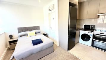 1 bedroom, desk, iron/ironing board, travel cot