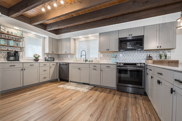 House, Multiple Beds, Fireplace | Private kitchen | Fridge, microwave, oven, stovetop