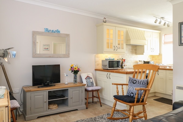 Fridge, electric kettle, toaster, cookware/dishes/utensils