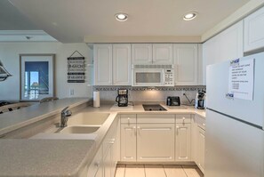 Microwave, oven, stovetop, ice maker - Beachfront Resort Condo, Book for Bike Week (Daytona Beach)