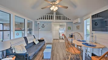 House (1 Bedroom) | Living area | TV, books