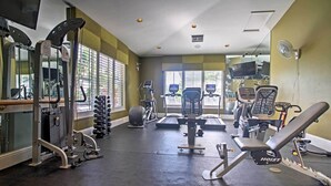 A gym with exercise equipment, treadmills, and weight machines. - Free Golf Until Oct! Naples Condo w/ Resort Pool (Naples)
