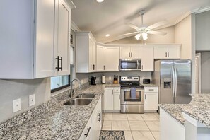 Microwave, oven, stovetop, dishwasher - Stunning Cape Coral Home w/ Open Floor Plan! (Cape Coral)
