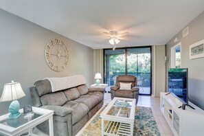 Apartment (1 Bedroom) | Living area | Flat-screen TV, books - Bonita Springs Vacation Rental w/ Community Pool! (Bonita Springs)