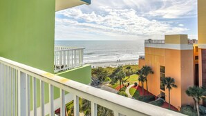 A balcony with a view of the beach and ocean. - Caravelle Tower Condo Rental: Walk to Beach (Myrtle Beach)