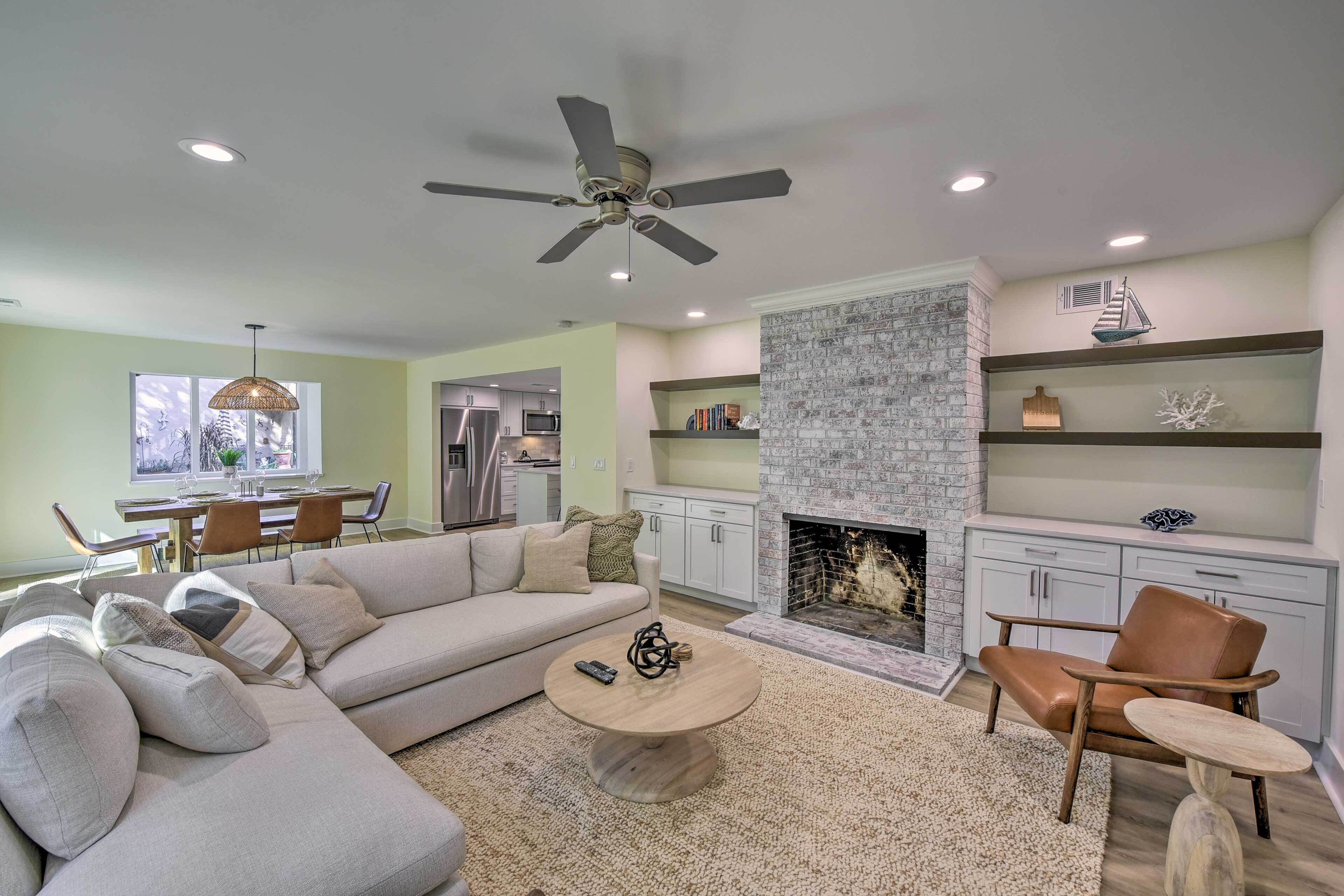 Villa (3 Bedrooms) | Living area | TV, fireplace, books