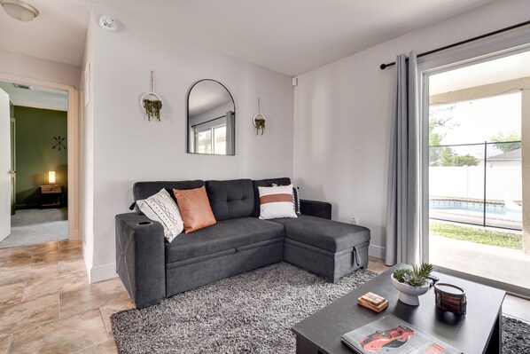 TV, books - Kissimmee Vacation Rental: Fenced-in Yard w/ Pool! (Poinciana)