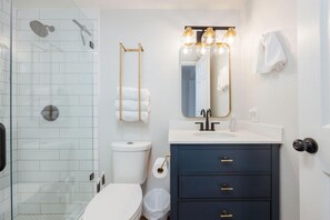 Bathtub, hair dryer, towels