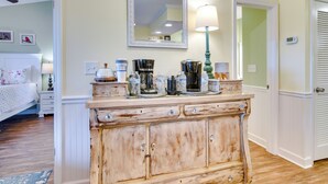 A room with a vintage wooden dresser, a mirror, and a lamp. - Branson Condo w/ Views - Near Silver Dollar City! (Branson West)