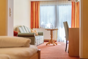 Suite junior | Caja fuerte, cortinas opacas, sistema de insonorización