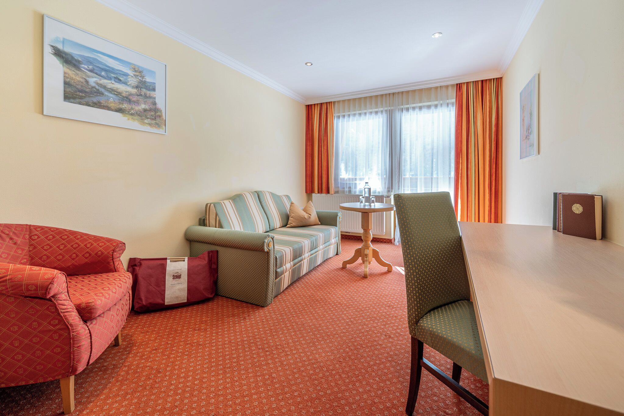 Junior Suite | Living area | 30-inch TV with satellite channels