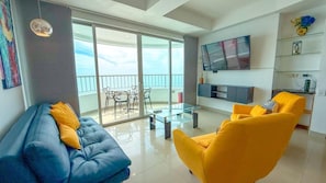 Standard Apartment | Living area | 32-inch LCD TV with cable channels, TV, heated floors