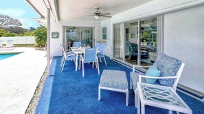 Outdoor dining - BOOK NOW & SAVE!! CLOSE TO IMG!  Base Rent has been REDUCED by 20 percent!  LOVELY THREE BEDROOM TWO BATH HEATED POOL HOME CLOSE TO ANNA MARIA ISLAND! (Bradenton)