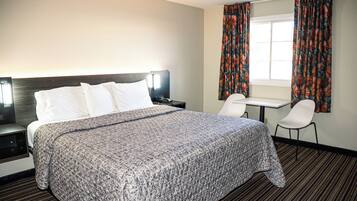 Luxury King Suite | 1 bedroom, desk, iron/ironing board, free WiFi