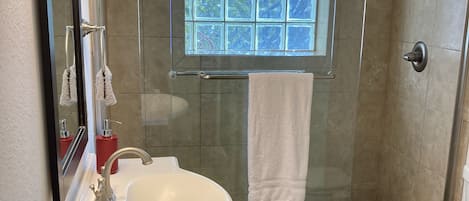Shower, hair dryer, towels, soap