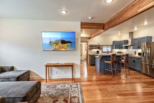 Grand House | Living area | 65-inch TV with digital channels, streaming services