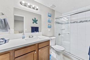 Shower, hair dryer, soap, shampoo