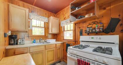 Cozy Carp Lake Cottage w/ Dock, Kayaks & Fire Pit