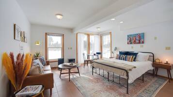 Apartment (0 Bedroom) | Desk, laptop workspace, bed sheets