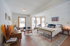 Apartment (0 Bedroom) | Desk, laptop workspace, bed sheets