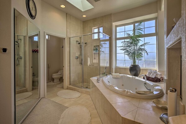 Enjoy a relaxing soak in the bathtub or refresh in the walk-in shower.