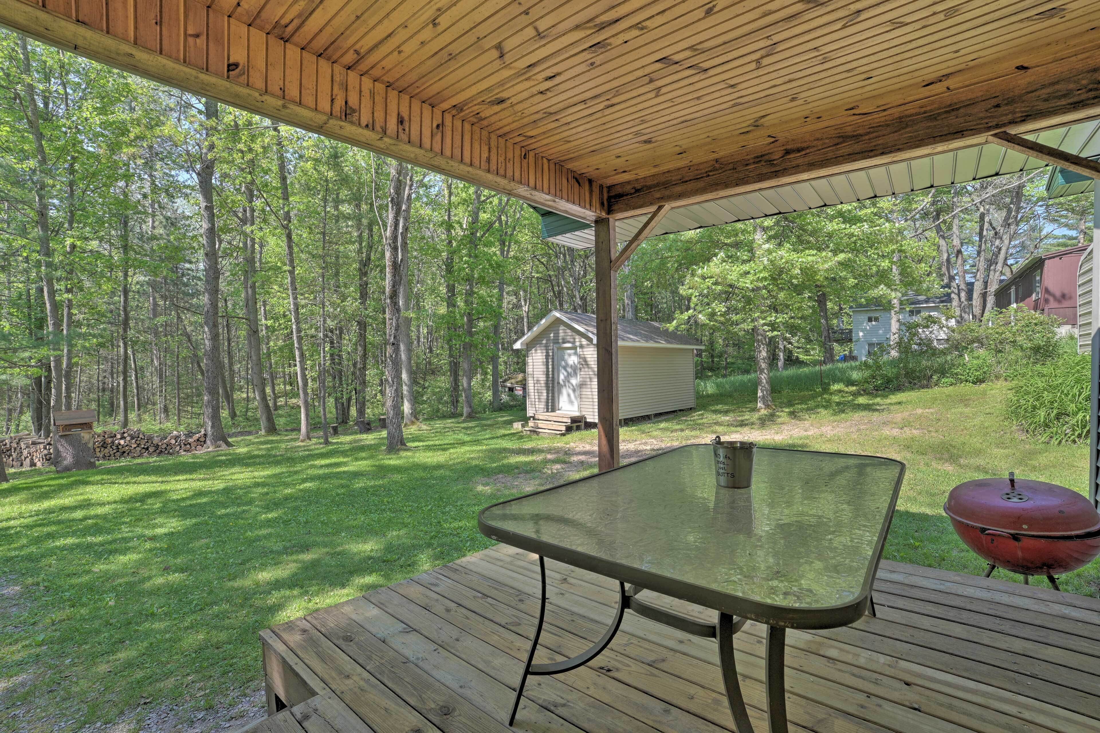 Rustic Wooded Retreat w/ Fire Pit, Near Trails!