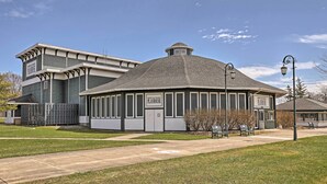 A building with a sign reading "Merry-Go-Round Playhouse" and a smaller building with a sign reading "Merry-Go-Round Playhouse." - Auburn Vacation Rental Home Near Owasco Lake! (Auburn)