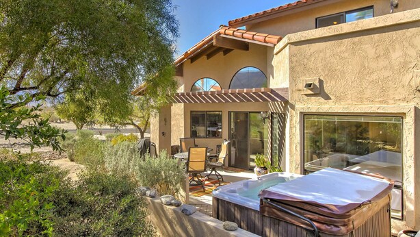 A house with a patio, a hot tub, and a view of the surrounding landscape. - Borrego Springs Condo w/ Private Hot Tub & Views! (Borrego Springs)