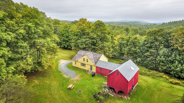 A rural property with a barn, a yellow house, and a well-maintained lawn. - Historic Hanover Area Home, 16 Miles to Dartmouth! (Enfield)