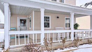 A two-story house with a covered porch, a 'Welcome' sign, and a wreath on the door. - Meadow Retreat' Near Parks & USU (Logan)