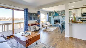 House (3 Bedrooms) | Living area | TV, fireplace, books