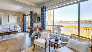 TV, fireplace, books